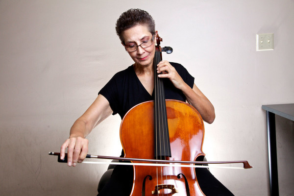 Adult student practicing cello