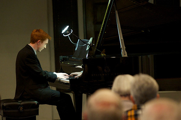 Christopher Goodpasture playing the piano
