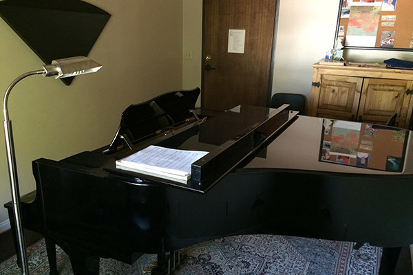 Piano in a practice studio