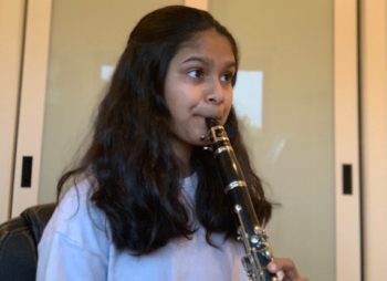 Girl plays clarinet