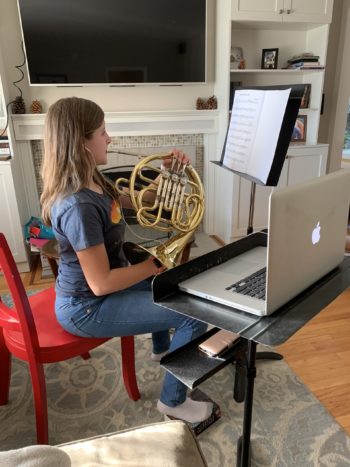 Girl plays french horn