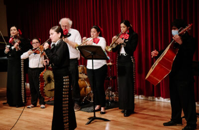 Mariachi ensemble performs on stage