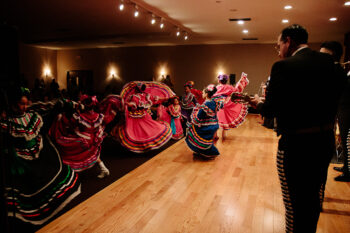 Mexican folklorico dancers perform in colorful costumes